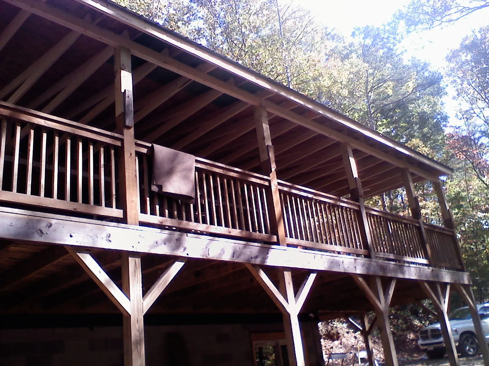 Timber framing under a new elevated porch and deck — Roof Leak Repair in Golden Valley by Roofing Brothers